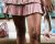 Woman in miniskirt with shoe