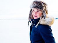 Fashionable woman outside smiling